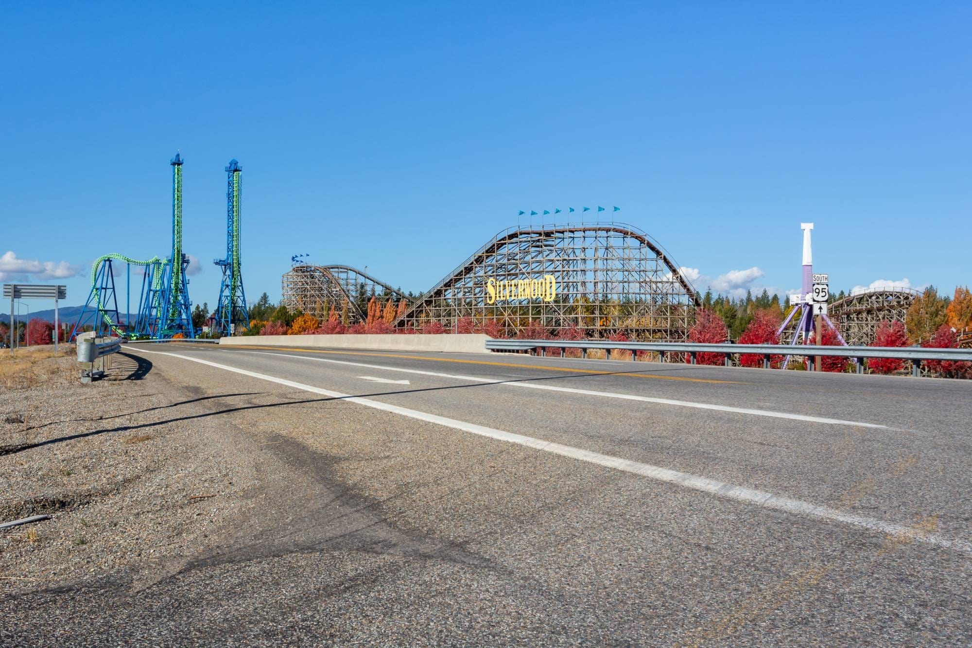 Silverwood Theme Park roller coasters rising beside Highway 95 near Athol, Idaho