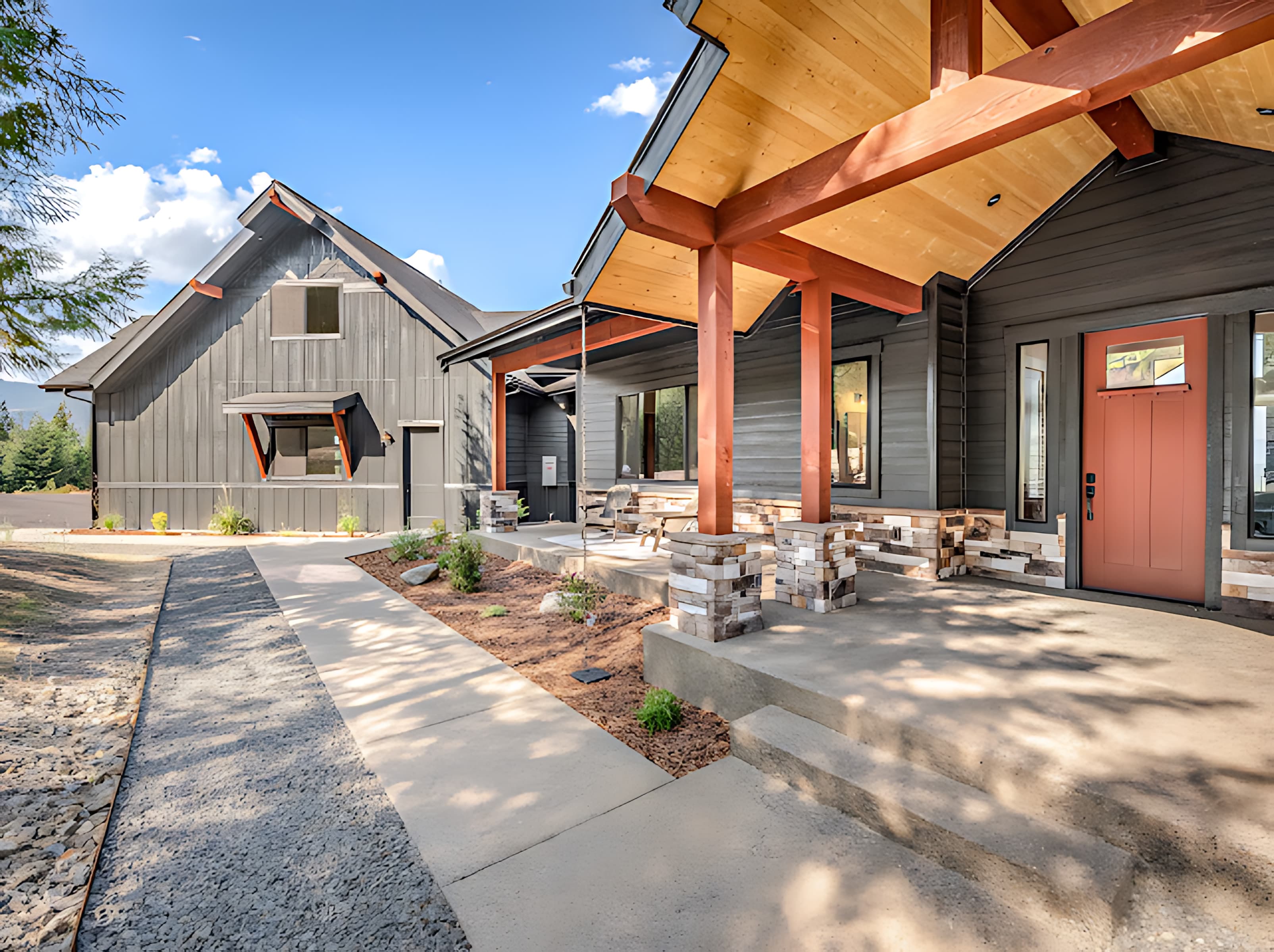 Timber frame entry porch on an ONYX custom home